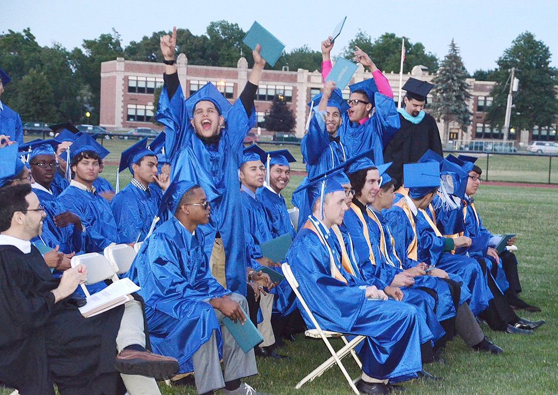 <p class="Picture"><span style="font-family: Arial, sans-serif;">An animated group of boys shows some excitement about graduating.&nbsp;</span>Richard Abel|Westmore News</p> <p class="Picture"><span style="font-family: Arial, sans-serif;"></span></p>