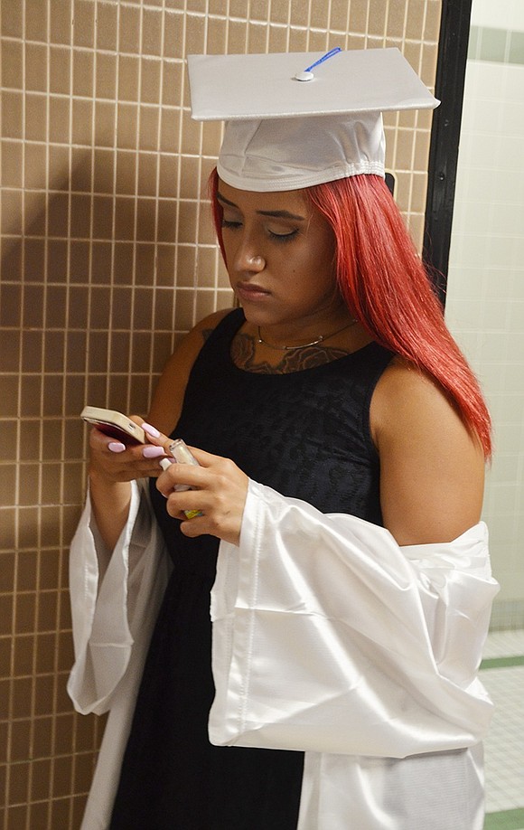 <p class="Picture"><span style="font-family:'Arial','sans-serif';">The scene at the Port Chester High School commencement on Friday, June 24 with female graduating seniors wearing white gowns in the foreground and the packed stands at Ryan Stadium in the background.&nbsp;</span>Richard Abel|Westmore News</p>