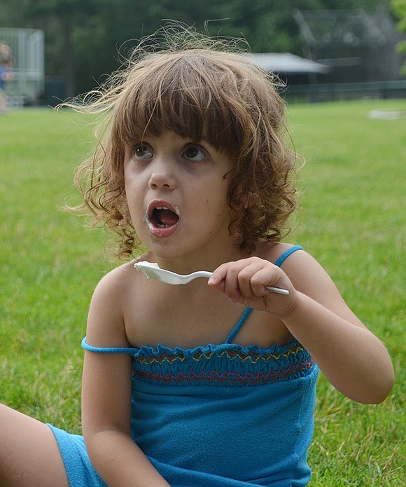 <p class="Picture">Three-year-old Armett Street resident Kathyrn Melone prepares to chomp down on her spoonful of vanilla ice cream.</p> <div><!--[if !supportAnnotations]--> <div> <div id="_com_1" class="msocomtxt" language="JavaScript"> <!--[if !supportAnnotations]--></div> <!--[endif]--></div> </div>