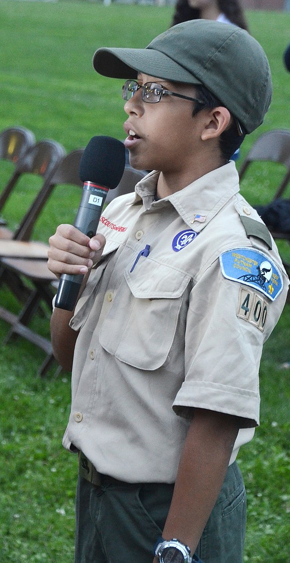 <p class="Picture">Nicholas Bolanos from Port Chester Boy Scout Troop 400 leads the Pledge of Allegiance.</p>