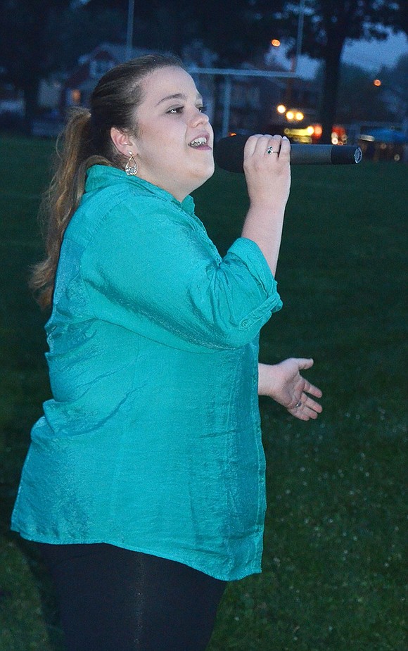 <p class="Picture">Rosie Veltri of Port Chester sings &ldquo;God Bless America.&rdquo;</p>