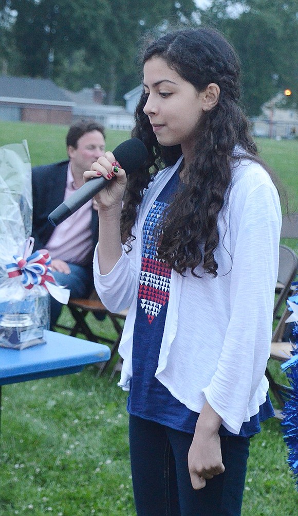 <p class="Picture">Gabriella Buccieri of Port Chester sings &ldquo;God Bless the USA.&rdquo;</p>