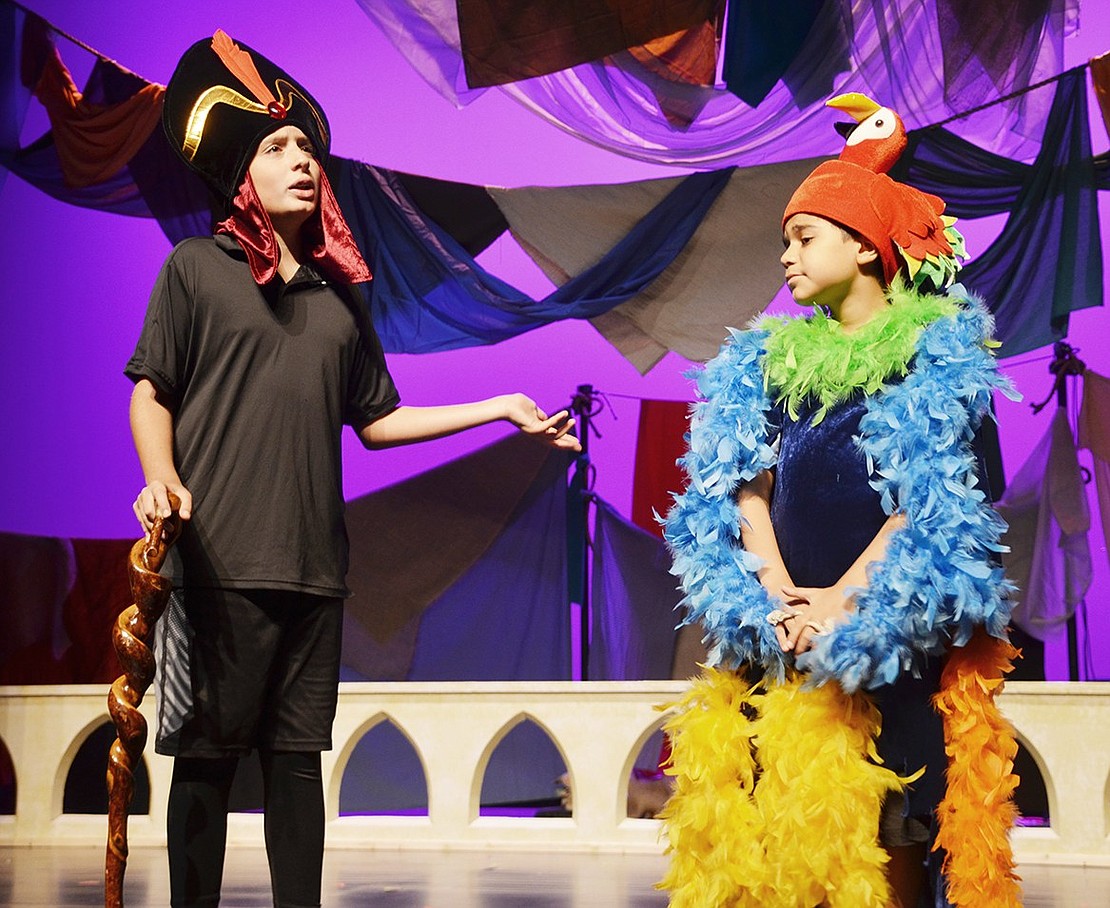 <p class="Picture">Iago, played by Port Chester resident Ivan Lopez and Jafar, played by Sean Mealey, plot about who the mysterious Prince Ali Ababwa could really be and how they will get rid of him so Jafar can be Sultan of Agrabah, in the Port Chester Recreation Department/Port Chester Council for the Arts production of &ldquo;Aladdin Jr.&rdquo; The musical will be performed at the Rye Country Day School Performing Arts Center Friday, July 29 and Saturday, July 30 at 7:30 p.m. Tickets will be available at the door at $15 for adults and $12 for seniors and children under 12.</p> <p class="Right">Casey Watts|Westmore News</p>