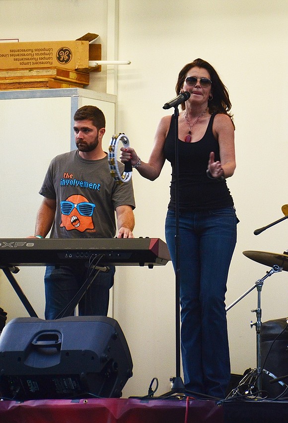 <p class="Picture">Rye Brook resident and Avalon Rose&rsquo;s lead vocalist Kathiryn &ldquo;Kat&rdquo; Werlinich on the tambourine and keyboardist Mike Smith rock out.&nbsp;</p>