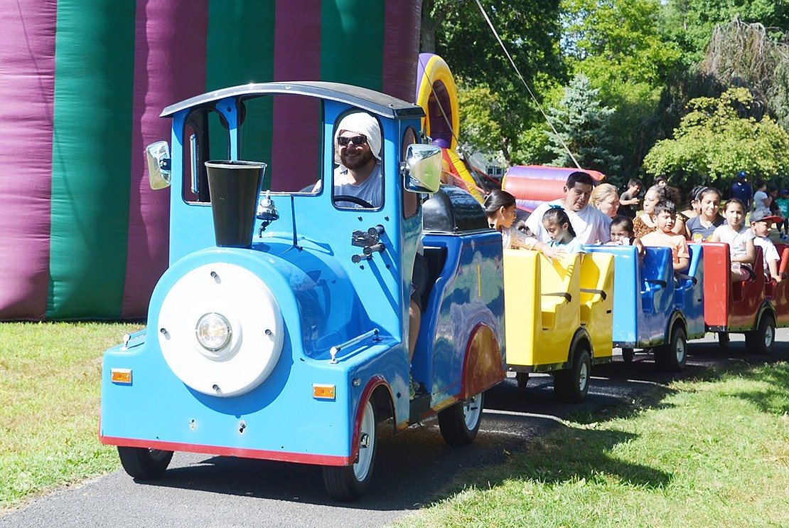 <p class="Picture">Choo-choo! All aboard the Lyon Park express! There wasn&rsquo;t a moment in which this little train wasn&rsquo;t circling the park and towing excited children and their parents.&nbsp;<span style="font-size: 13.3333px;">Photo story by Casey Watts.</span></p> <div><span style="font-size: 13.3333px;"><br /> </span></div>