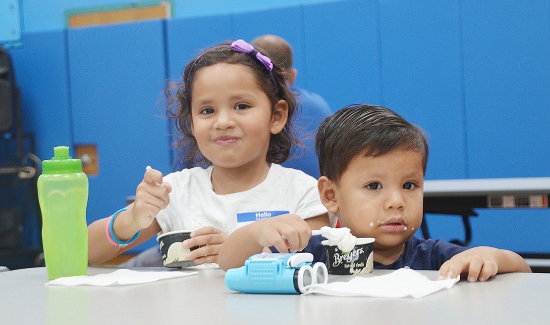 <p class="Picture">Five-year-old Alexa Melgar of Putnam Avenue is joined by her 2-year-old brother Axel at King Street School&rsquo;s ice cream social. Alexa couldn&rsquo;t wait to start kindergarten on Tuesday, Sept. 6. Photo Story By Casey Watts</p>