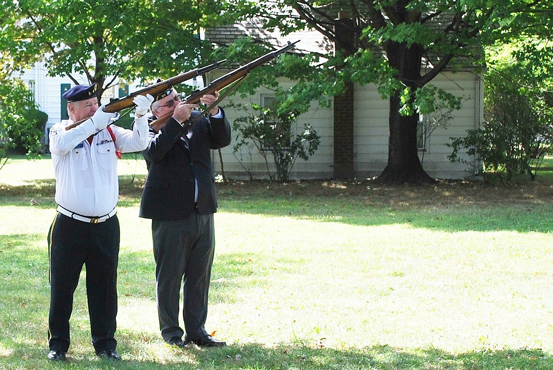 <p class="Picture"><span style="font-family: Arial;">William Chiapetta and Kenny Neilsen of the Port Chester American Legion fire their rifles in salute.</span></p> <span style="font-family: Arial;"> Richard Abel|Westmore News</span>