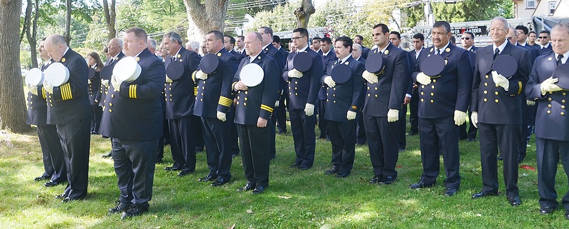 <p class="Picture">Members of Port Chester&rsquo;s Volunteer Fire Department all take off their caps in respect for those who lost their lives 15 years ago. Some of them responded to the 9/11 attacks and stood on the pile of rubble from the fallen Twin Towers.</p> <p class="Right">Casey Watts|Westmore News</p>