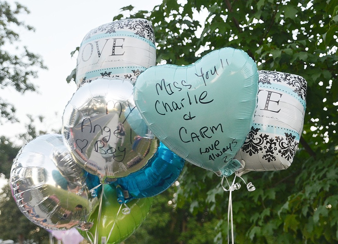 <p class="Picture">Six Port Chester and Rye Brook parents send messages written on balloons to the heavens. They knew their deceased children would be up in the sky waiting to catch the strings.&nbsp;</p>