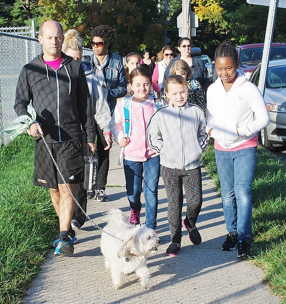 <p class="Picture">A good turnout of students, parents and several dogs participated in King Street School&rsquo;s Walk to School Day. They walk from King Street up the sidewalk on Upland Street to the elementary school.</p>