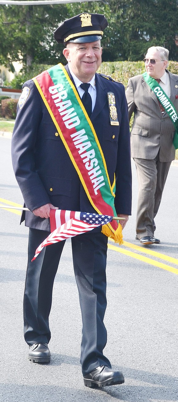 <p class="Picture">Grand Marshal and Port Chester Police Chief Richard Conway marches with the Columbus Day Celebration Committee at the front of the Port Chester/Rye Brook Columbus Day Parade.</p>