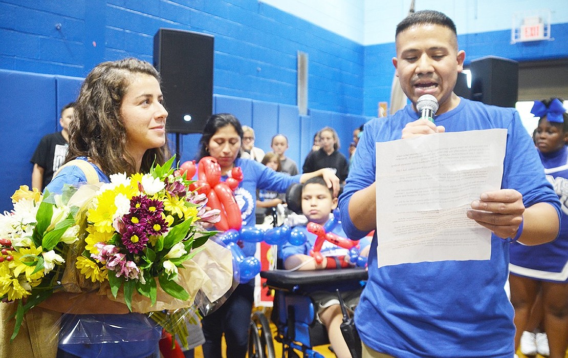 <p class="Picture">Paul Rojas thanks his good friend and Port Chester Middle School teacher Allison Silverman, who played a big part in organizing the second Super Brothers B Fun Run/Walk.&nbsp;</p>
