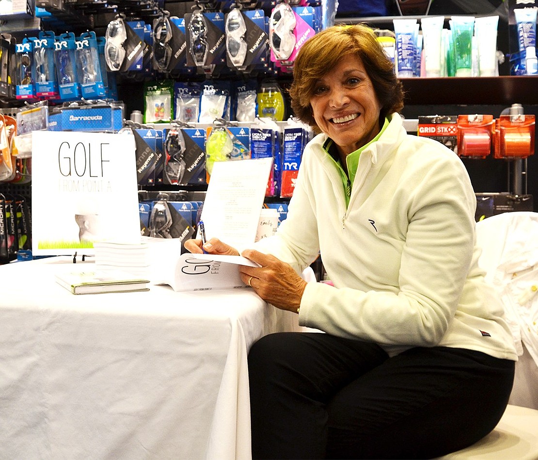 <p class="Picture">Author Valerie Lazar shows off her new book &ldquo;Golf From Point A,&rdquo; which explains how critical the mental side of the game is. &ldquo;What you think is how you play,&rdquo; Lazar said.&nbsp;</p>