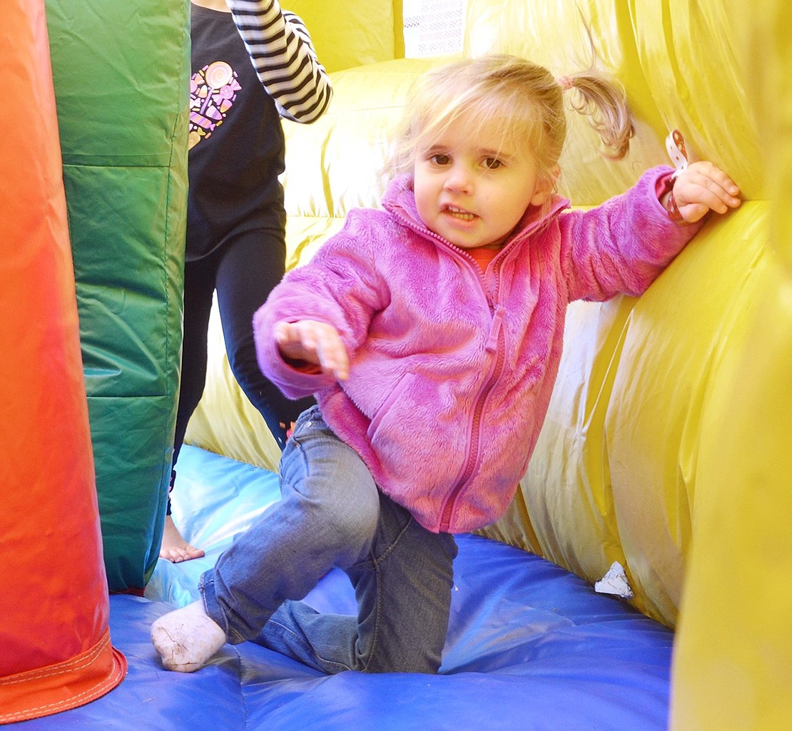 <p class="Picture">At almost 2 years old, Victoria Allmashy of Whittemore Place was having the time of her life in the inflatable obstacle course.&nbsp;</p>