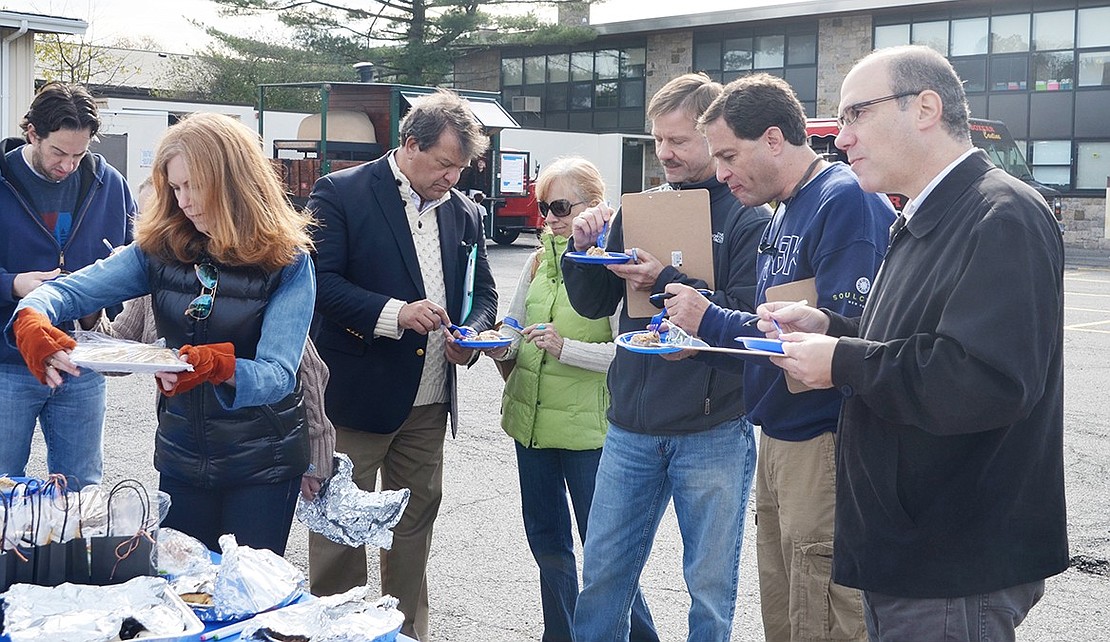 <p class="Picture">State Senator George Latimer, Blind Brook Superintendent Dr. Jonathan Ross, Rye Brook Mayor Paul Rosenberg and Blind Brook Board of Education President Jeff Diamond were the judges for this year&rsquo;s bake off. They scored the dishes on their taste and presentation &ndash; qualities that attracted many of the festival&rsquo;s attendees as well as a lot of bees.&nbsp;</p>