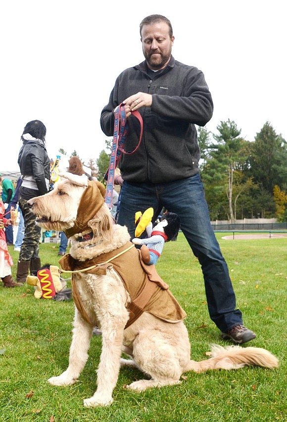 <p class="Picture">Costume contest winner Sam was not too pleased about being a noble steed for a plush cowboy. He let anyone who was listening, including his owner, Brian Goldberg of Pine Ridge Road, know how much he disliked his antlers.&nbsp;</p>