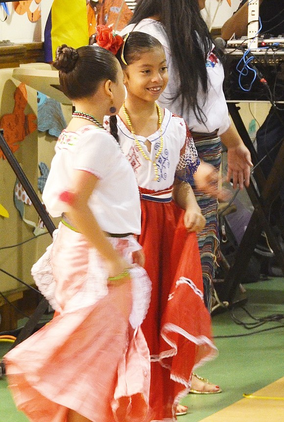 <p class="Picture">Two girls dance to the Mariachi Band&rsquo;s music.&nbsp;</p>