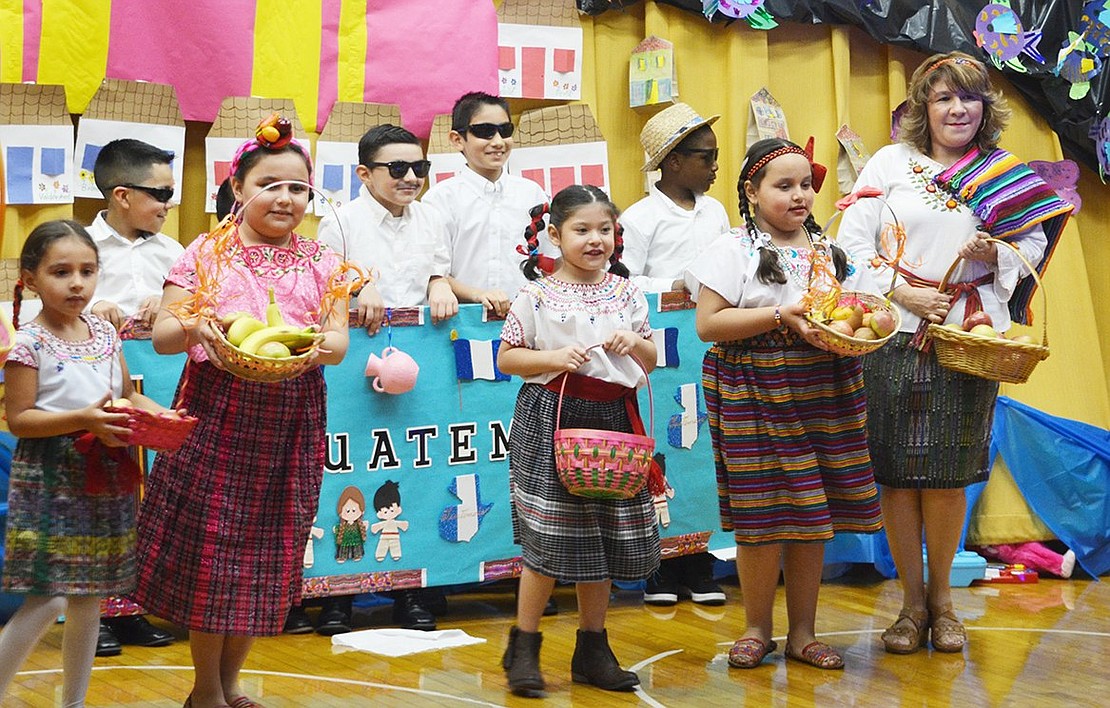 <p class="Picture">Kids of all ages came together for a Guatemalan song, &ldquo;Yo Soy Puro Guatied.&rdquo;&nbsp;&nbsp;</p>