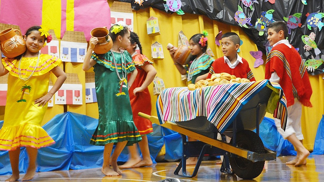 <p class="Picture">Fourth graders show their moves to a traditional Bolivian dance and song, &ldquo;El Carretero.&rdquo;</p>