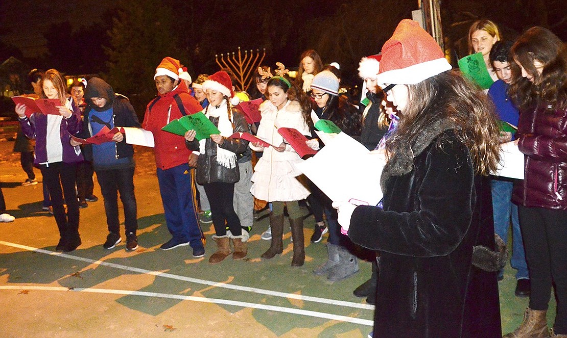 <p class="Picture">The Blind Brook High School Choir spreads some holiday cheer with carols.&nbsp;</p>