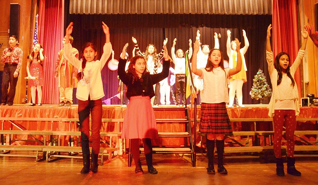 <p class="Picture">The students dance and sing a song about the meaning of Christmas and how it is spent in Aruba.&nbsp;</p>