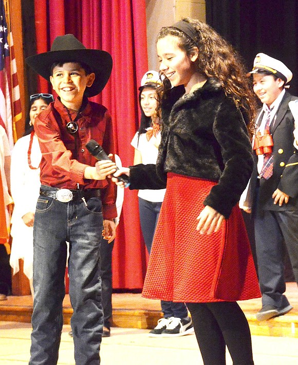 <p class="Picture">Tex, played by Johnny Zapata, talks about how he and his wife Rosalea, played by Gabriella Vilas Boas, spend Christmas.&nbsp;</p>