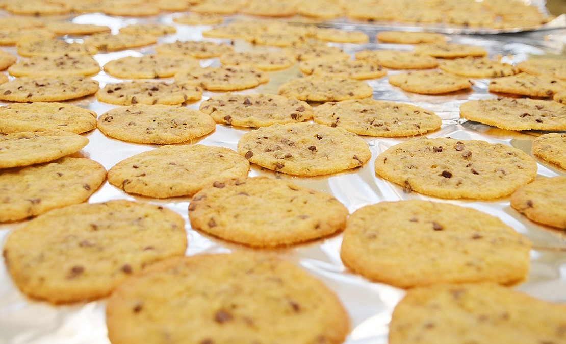 <p class="Picture">Chocolate chip cookies are left to cool on the table. According to Rye Brook Seniors coordinator Elizabeth Rotfeld, these cookies were made a little differently so they&rsquo;re crunchy and not soft.</p>