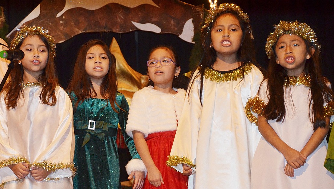 <p class="Picture">Second graders, from left, Gabriella Costa, Rachel Ramirez, Gianella Ramirez, Yomaira Morocho and Ariana Ayala close the production with &ldquo;Joy to the World&rdquo; as part of Corpus-Christi-Holy Rosary School&rsquo;s &ldquo;The Heart of Christmas&rdquo; performances by students in Pre-K through Grade 2 on Dec. 9. Photo Story by Jananne Abel</p>