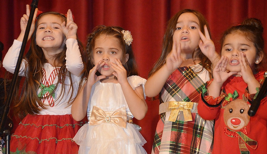 <p class="Picture">Four-year-olds Alexa Cardoza, Karol Fernandez, Talia Aiello and Juliana Mobarek are confident in their choreographed moves as they sing &ldquo;Mary&rsquo;s Boy Child.&rdquo;</p>