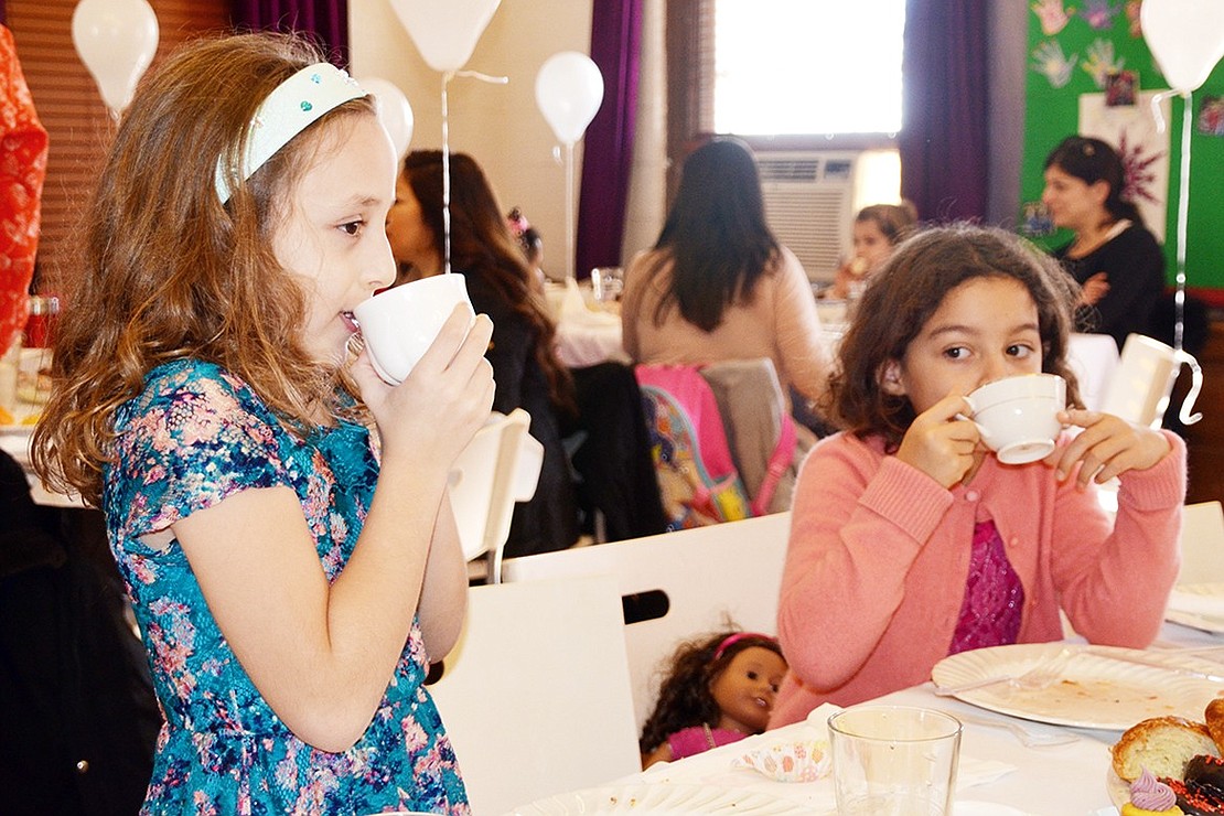 <p class="Picture">Six-year-old Port Chester residents Gianna Pennella and Sophie Stevens-Tauziet enjoy their tea.&nbsp;</p>