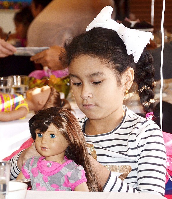 <p class="Picture">Picture perfect: 8-year-old Melina Morban of Shelley Avenue makes sure her doll looks as pretty as she does.&nbsp;</p>
