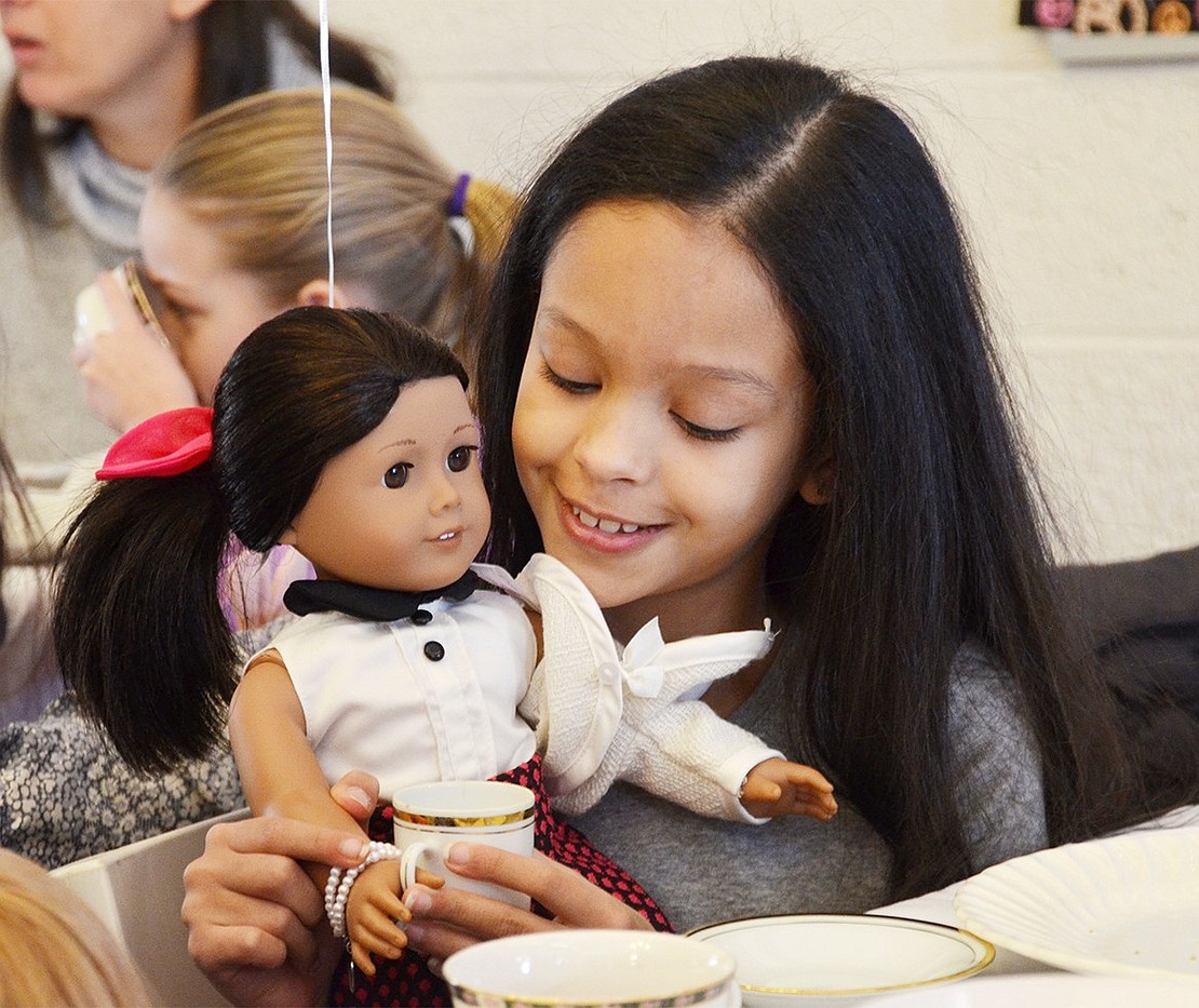 <p class="Picture">Alanis Abreu, 8, shares tea with her doll. The Sands Street resident had a lot of fun during the My Doll and Me Tea party on Sunday, Jan. 15 at the Girl Scout House in Lyon Park. There were 78 attendees and all money raised went to the Girl Scout Scholarship Fund.&nbsp;</p> <p class="Picture">Photo Story by Casey Watts</p>