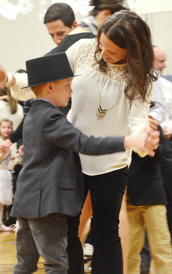 <p class="Picture">Ryan Brown dances with his mother Alison.&nbsp;</p>