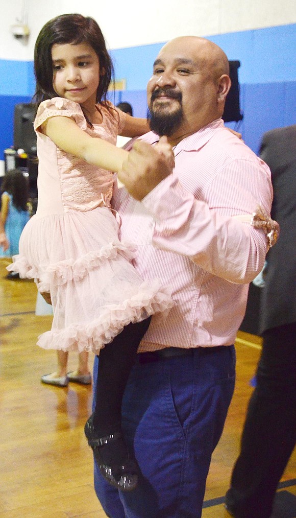 <p class="Picture">Not all the dancers were on their feet. Sergio Torres holds his 6-year-old daughter Mariana during a slow song<span style="font-family: Arial;">,&nbsp;</span><span style="font-family: Arial; font-size: 13px;">at King Street School&rsquo;s Father Daughter Dance on Friday, Feb. 17.&nbsp;</span></p> <br /> <div><span style="font-size: 13px;"><br /> </span></div>