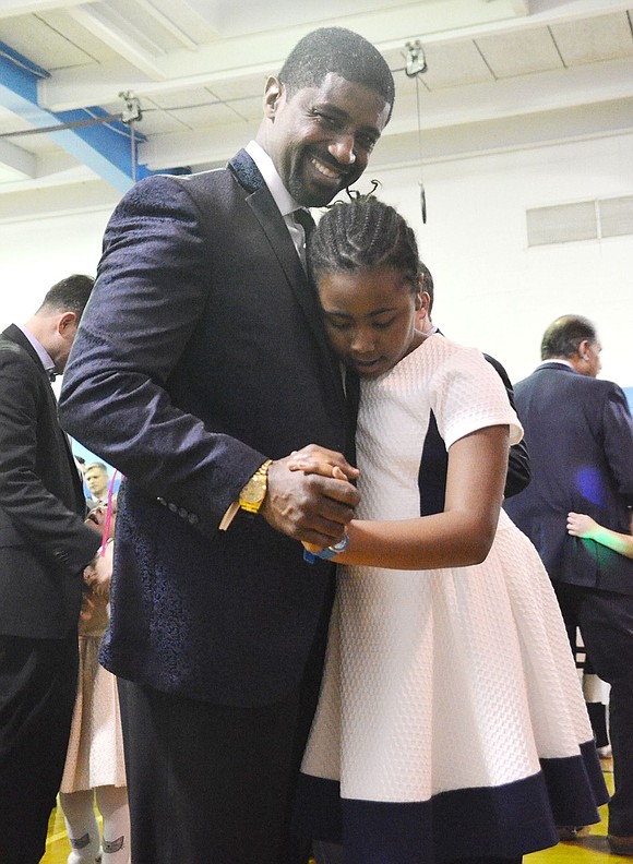 <p class="Picture">There&rsquo;s nothing like the bond between a father and his daughter. Anthony and Toni Ash, 9, enjoy a slow dance.&nbsp;</p>