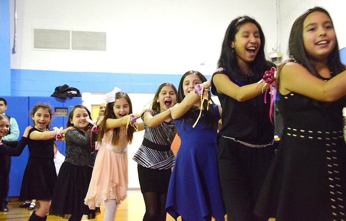 <p class="Picture">The girls decided it was time for a conga line!</p>