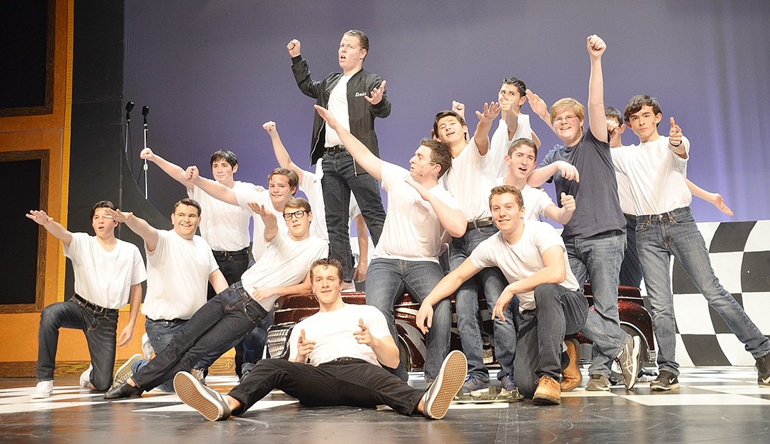 <p class="Picture">The ensemble of boys pose after the song &ldquo;Greased Lightning.&rdquo;</p>