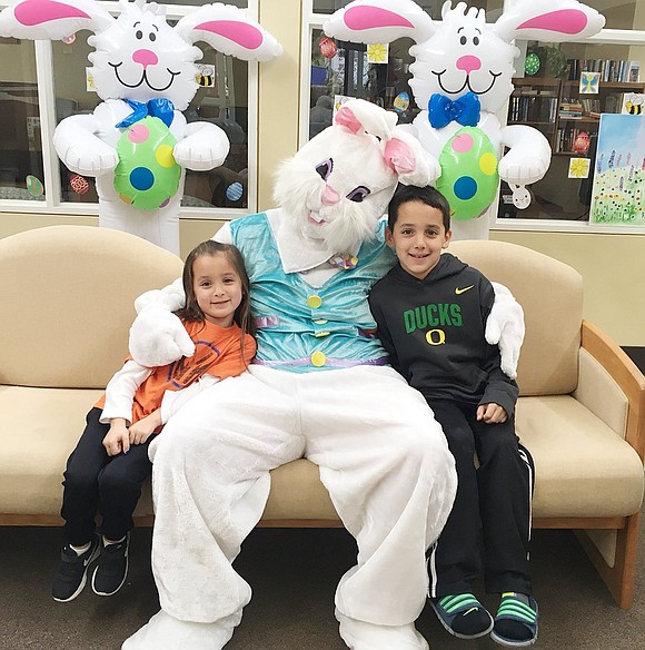 <p class="Picture">The Easter Bunny decided to take time out of his busy schedule painting, stuffing and hiding eggs to visit the Posillipo Center in Rye Brook on Saturday, April 1. Rye Brook resident Matty Zimmerman, 8, and his sister Mia, 5, pose with the holiday celebrity during Rye Brook Recreation&rsquo;s Lunch with the Bunny. </p> <p class="Right">Courtesy of Luci Zimmerman</p>