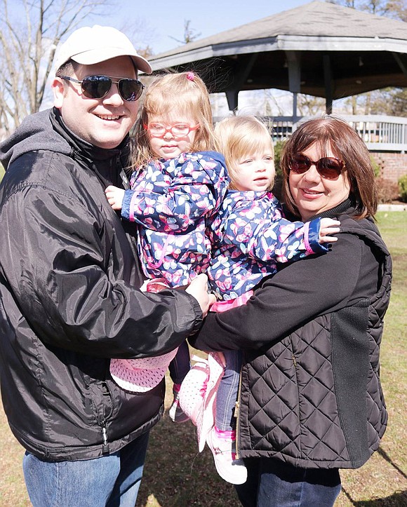 <p class="Picture">Michael Johnson of Valley Cottage and his mother Patty of Port Chester hold Joe&rsquo;s 2-year-old twins Alice and Cassandra who came to the park to see the Easter Bunny.</p> <p class="Right">Joseph DeCarlo|Westmore News</p>