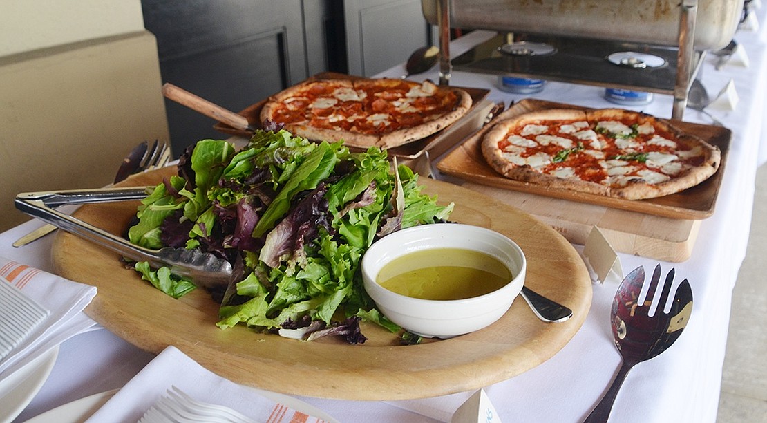 Rela Café had a large spread of pizza, house greens, pasta and meatball sliders. 