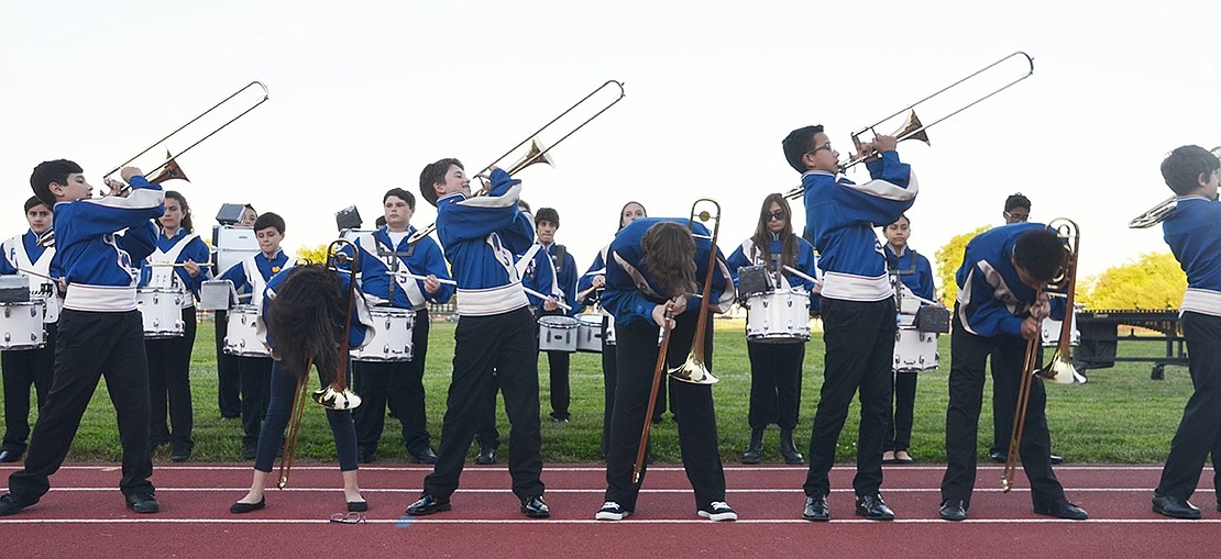 Port Chester Middle School Band members attempt a “trombone suicide routine” where half of the students bow while the others swing their instruments to the side. One wrong move could have ended up with a nasty bonk to the head, but the middle schoolers performed perfectly. 