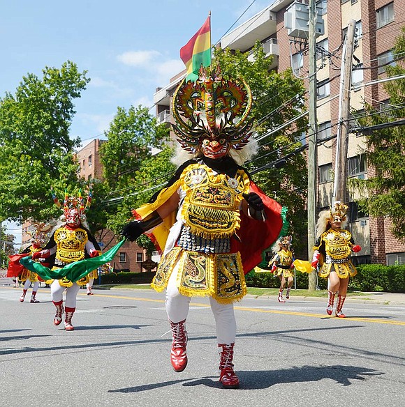 Even horned creatures know how to get their groove on. Fraternidad La Diablada shows off its Hellish Devil’s Dance. 