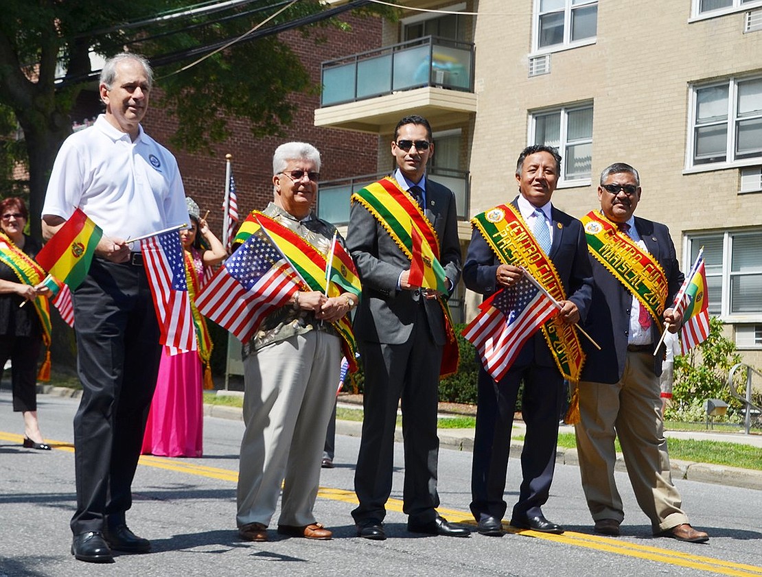 Government officials get in on the fun, leading the parade. They are, from left: Port Chester Trustee Gene Ceccarelli, Port Chester Mayor Richard “Fritz” Falanka, Alvaro Rodrigo Pinilla, Consul General of the Plurinational State of Bolivia in New York, and Rolando Escobar, president of the Bolivian Cultural Center in Port Chester, and Port Chester Trustee Luis Marino.