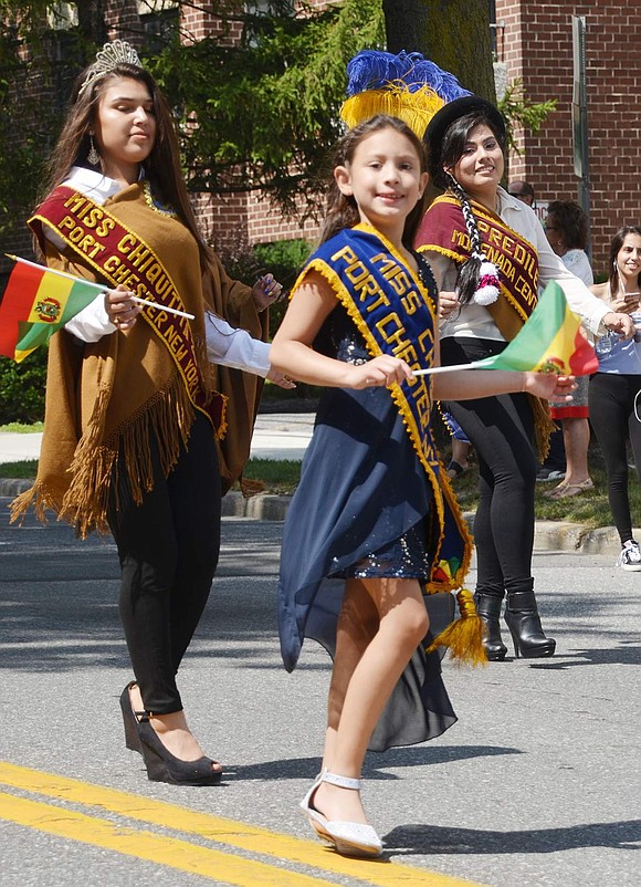 Miss Chiquita Port Chester is 9-year-old Allison Sanguino of White Plains. Behind her is Nina Reyes of Port Chester.