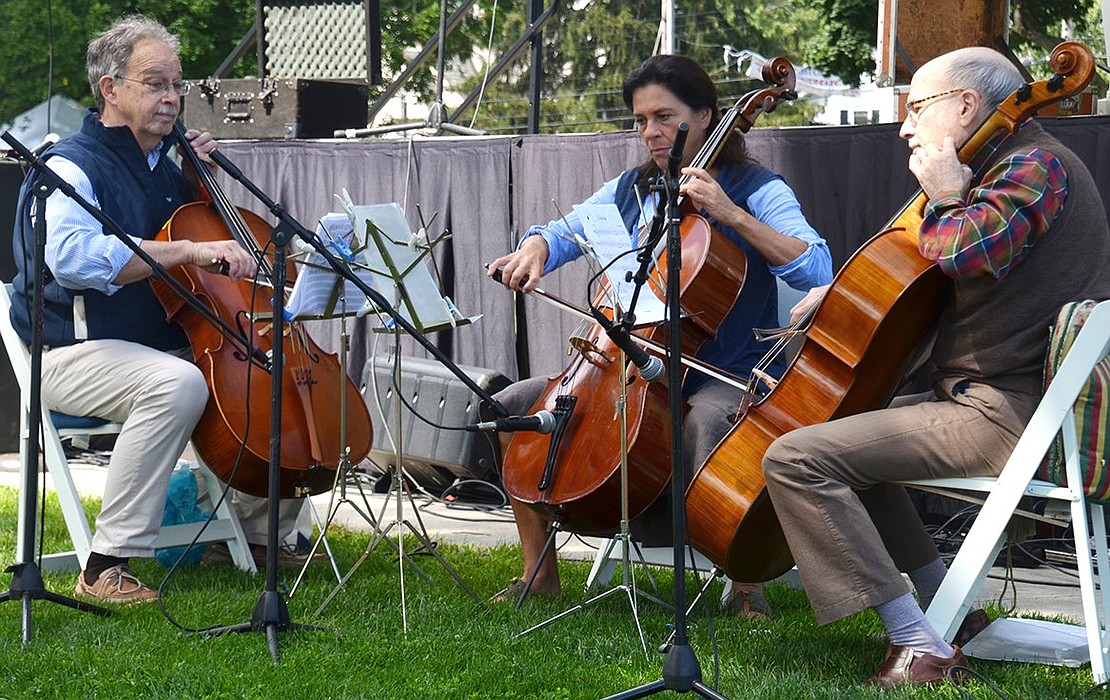 Carl Hermey of Guilford, Conn., Rezan Zia of Pound Ridge and Dickie Danehouer of Greenwich, Conn. comprise Tre Amici Cellisti which performed at Port Chester Day.