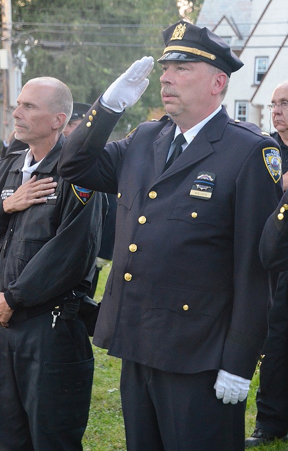 Port Chester Police Lieutenant Charles Nielsen and Scott Moore, administrator of the Port Chester-Rye-Rye Brook EMS, to his right, were among the many first responders in attendance.