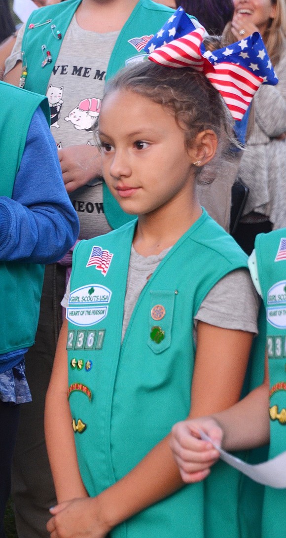 Sophia Moore of Troop 2367 was one of the Girl Scouts who took part in the remembrance. The Scouts concluded the ceremony by singing “God Bless America.”