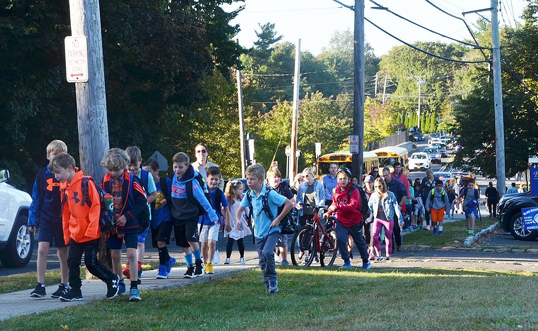 Hundreds of Bruno M. Ponterio Ridge Street School students, parents and siblings flood the sidewalks during the morning of Wednesday, Oct. 4 for International Walk to School Day. 