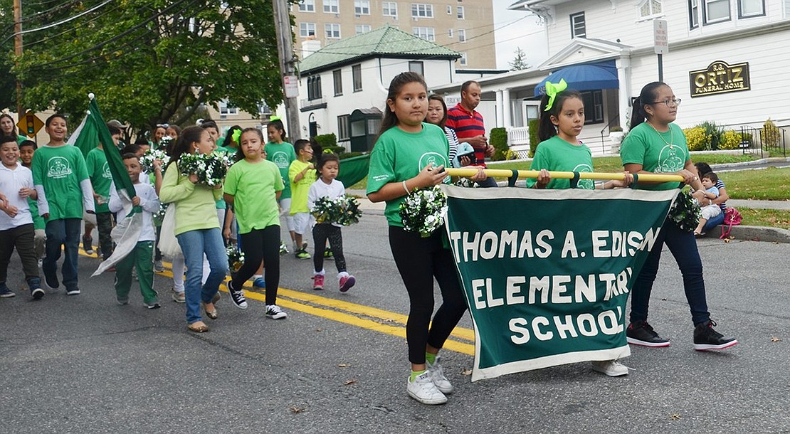 Thomas A. Edison Elementary School students show off their school pride by wearing green. 