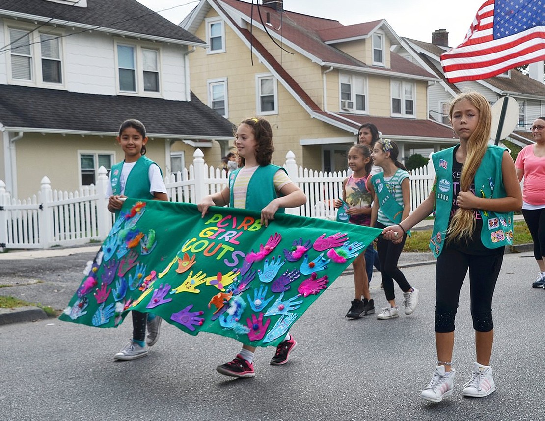 Port Chester and Rye Brook Girl Scouts followed the elected officials in the parade. 